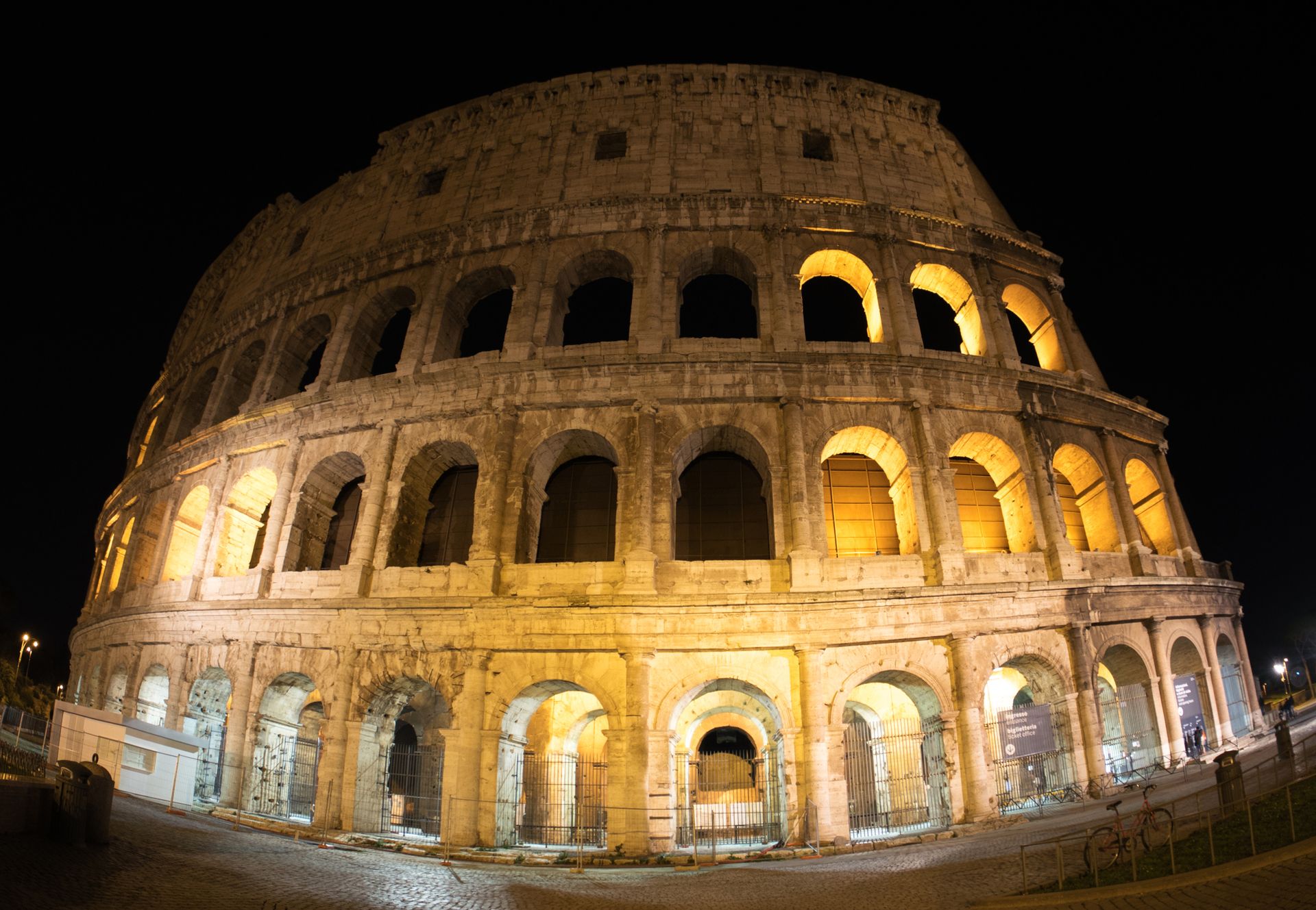 The Colosseum in Rome lit up at dusk