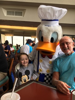 Eli's loving Disney at Mickey's Breakfast with Grandpa
